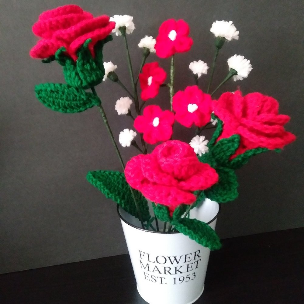 Handmade crochet bouquet of red roses,